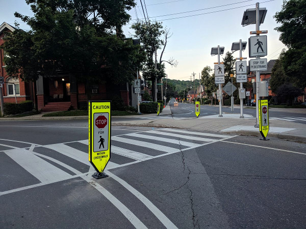 New bollard installed in correct spot between bike lane and car lane, May 25, 2018 (RTH file photo)