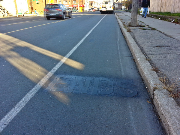 The old Bike Lane Ends pavement marking at Gage has been covered up