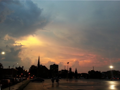 Between storm lashings, the city was treated to a spectacular sunset.