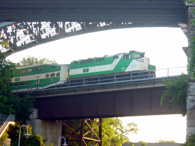 A GO train passes under the High-Level Bridge (RTH file photo)