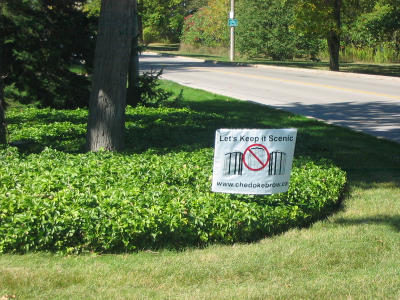 Example of lawn signs appearing frequently on Scenic Drive.