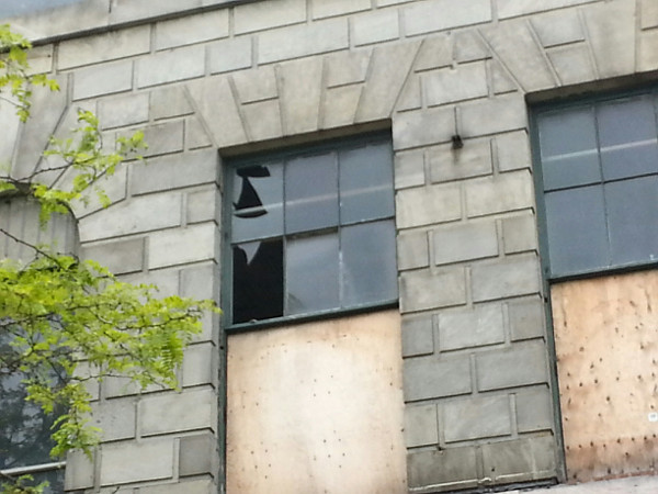 Broken window in William Thomas building