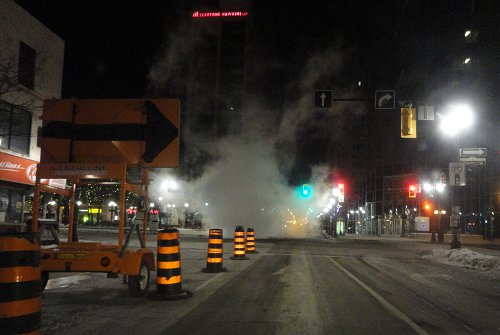 Steamy sewer work at King and James late at night on Friday, January 21