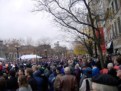 The crowd gathers to pay respect at the Gore Park Cenotaph.
