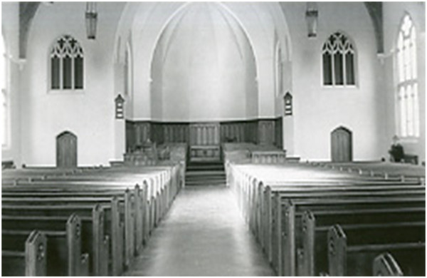 An early photo of the worship space of St John. We are looking south towards King Street
