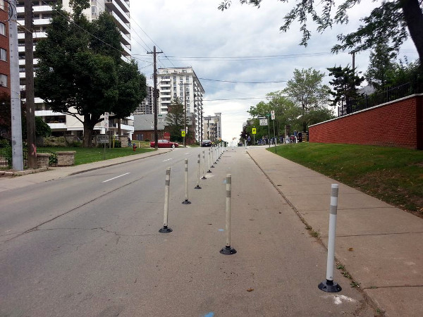 Bollards between the parking garage ramp and Bold Street