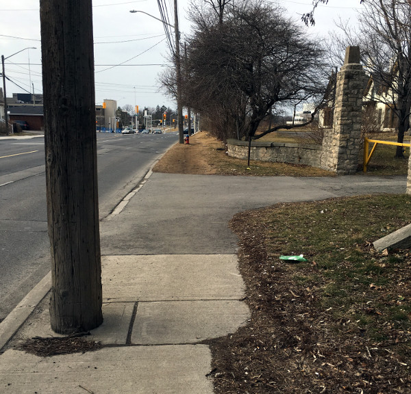 Pole in the middle of the sidewalk