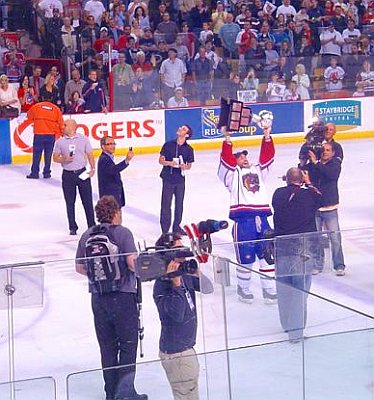 Proud Bulldog holds the Calder Cup aloft