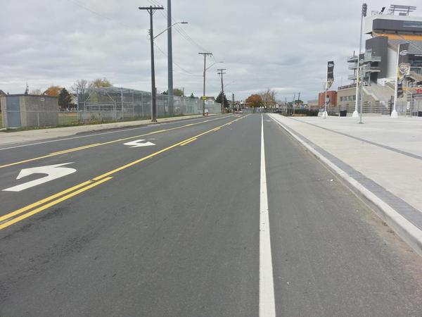 Westbound Cannon bike lane passing the stadium