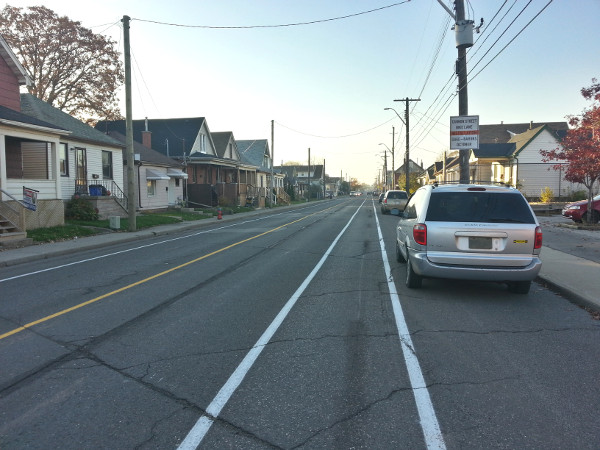 Door zone danger on westbound Cannon bike lane east of Ottawa