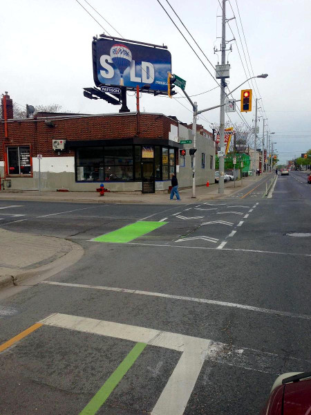 Intersection pavement markings on Cannon Cycle Track at John (RTH file photo)