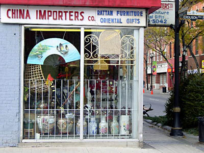 Signs in the window of China Importers (Ferguson and King) indicate a new Kitchen and Bath store is opening soon.