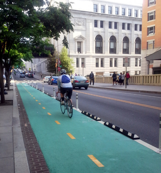 Cycle track protected by knockdown sticks and rubber curbs (Image Credit: District of Columbia Department of Transportation)