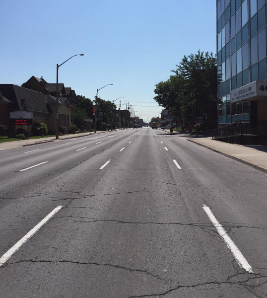 Main Street East between Erie and Ontario (Image Credit: Adrian Duyzer)
