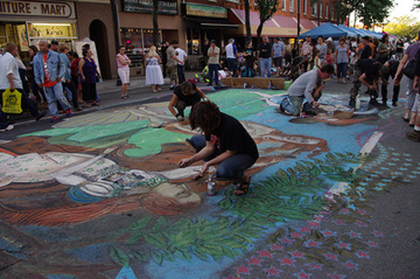 Artists and patrons enjoying themselves at one of the monthly Art Crawls along James Street North.