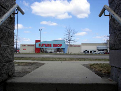 Future Shop framed by the stairway exit