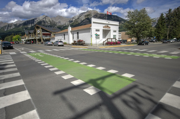 Green-marked bike lanes through intersections (Image Credit: Bike Canmore)