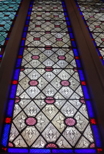 Tall stained glass window at front