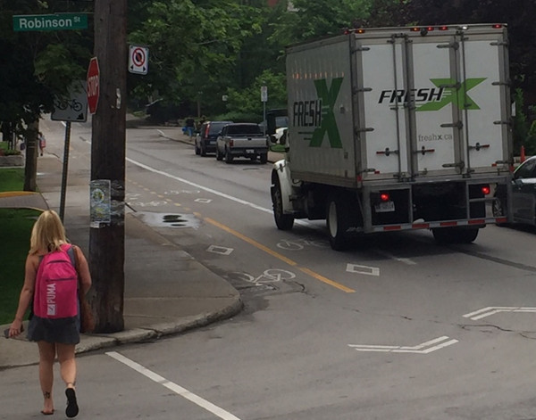 Truck almost halfway into the bike lane