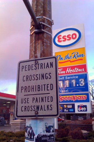 Pedestrian Crossings Prohibited sign on King at Dundurn. That intersection connects a residential neighbourhood with local commercial amenities including a grocery store. (RTH file photo)