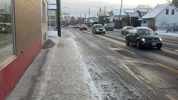 Snow not cleared on King Street West bike lane between Paradise and Macklin (Image Credit: Spencer Snowling/Twitter)