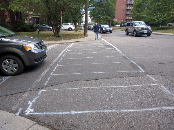 Pavement markings for planned ladder crosswalk on Park at Charlton