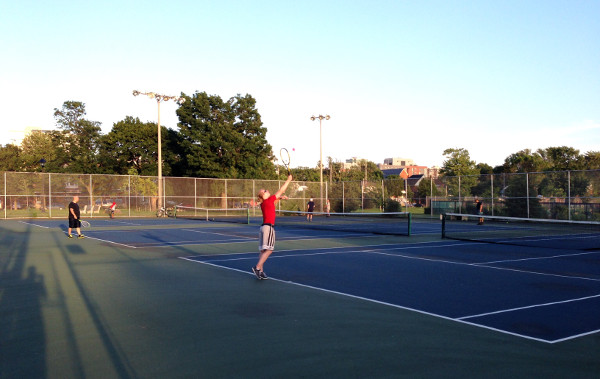 Playing tennis