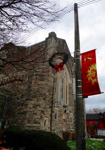 Locke South banners and wreaths hang from the hydro poles