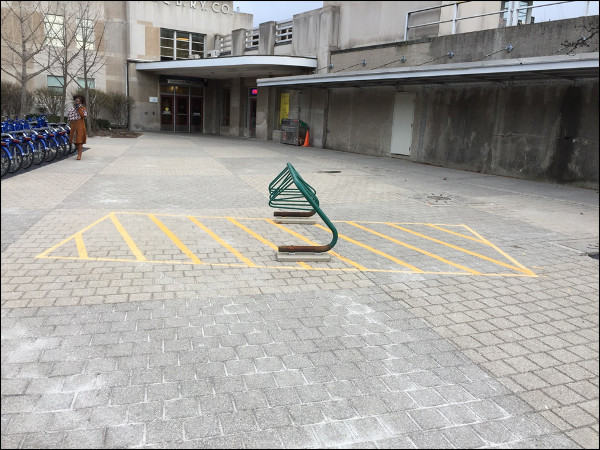 East pedestrian plaza. The area in the yellow stripes was used for automobile storage.