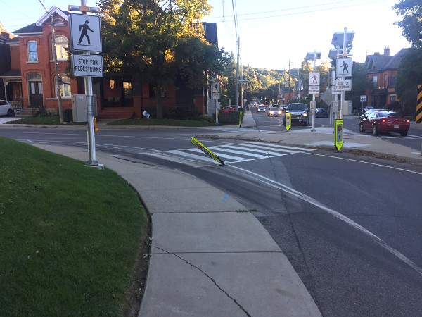 Same scene, different angle to better show the damaged bollard