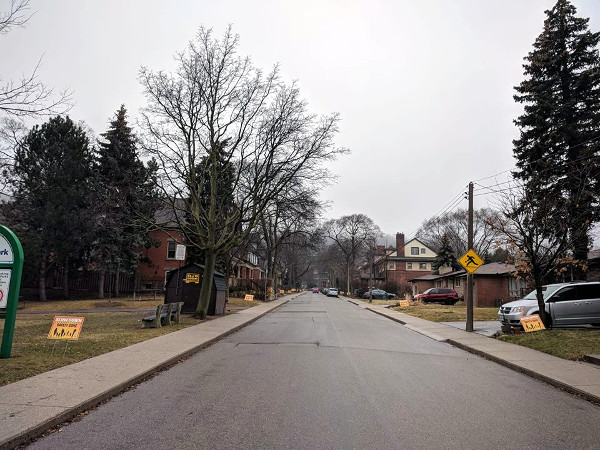 'Slow Down: Safety Zone' signs on Mapleside Avenue