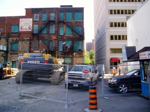 Fencing, equipment behind 18-28 King Street East (Image Credit: Eric McGuinness)