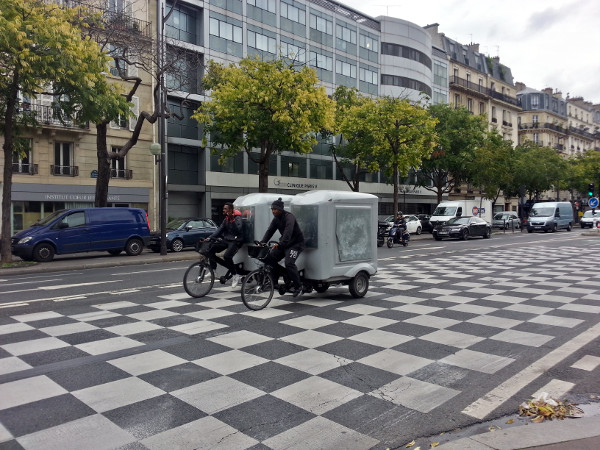 Bicycle cargo carriers riding in transit lane