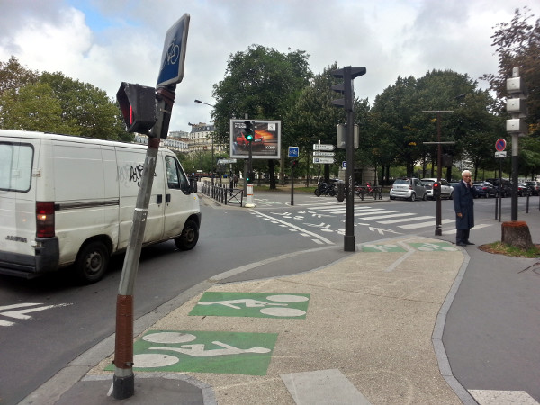 Bike lanes continue through complex intersection