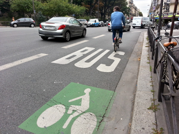 Cyclist riding on unprotected transit lane