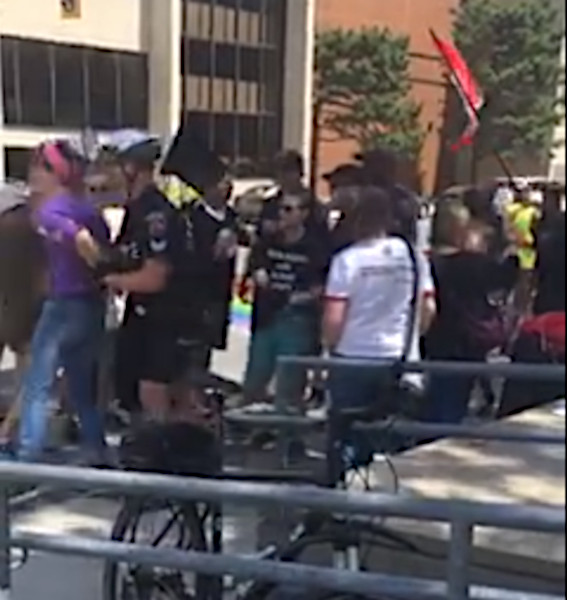 Police arresting counter-protester (Image Credit: Still from video recording by Ben Nelson)