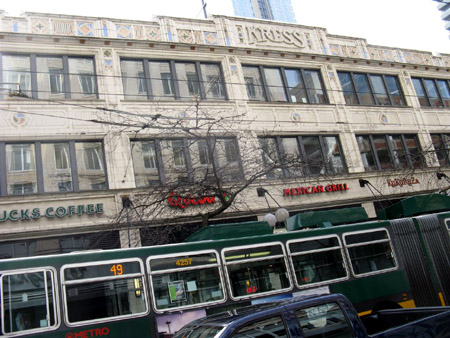 A gorgeous old building with an electric articulated bus. How I long for electric buses in Hamilton - they are so quiet when passing by.