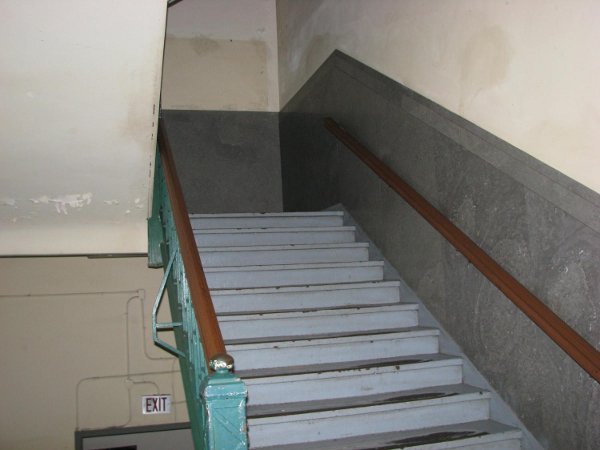 Polished stone cladding with hardwood handrails in excellent condition. All stairwells are of steel and in very good condition with minor wear.