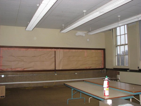 Classroom floor, walls, ceiling and windows in excellent shape.