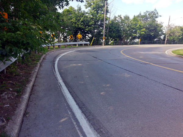 Scenic Drive bike lane gets very skinny at bend to West 35th