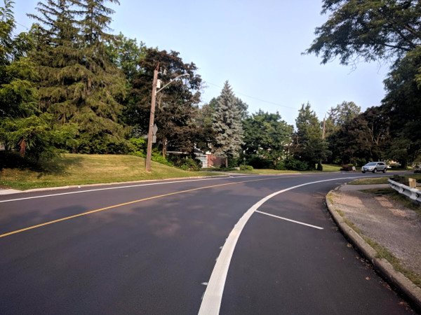 Hashed-out curb lane