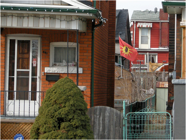 The Mohawk Flag, designed by Louis Hall as a variation on his original unity flag, has been adopted across the country. Here flying in the North End.