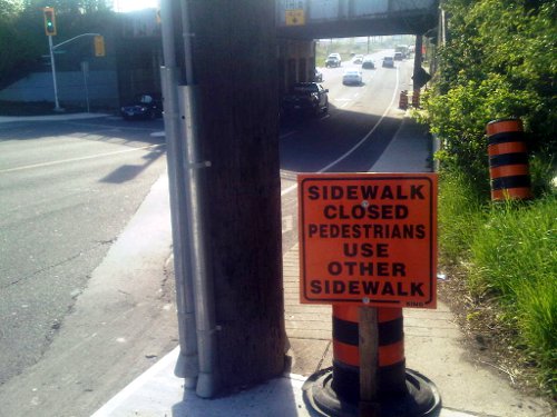Sidewalk Closed sign on Aberdeen at railroad underpass