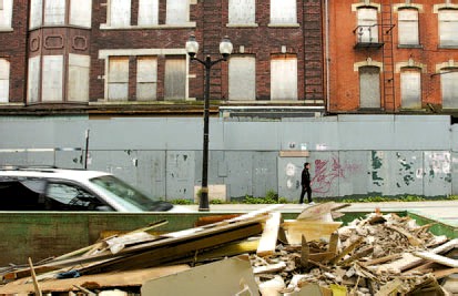 Re-investing in an old building to convert it into a gallery, cafe, and lofts does produce garbage. (Photo Credit: Hamilton Spectator)