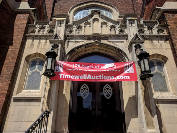 Front door with auction banner (RTH file photo)