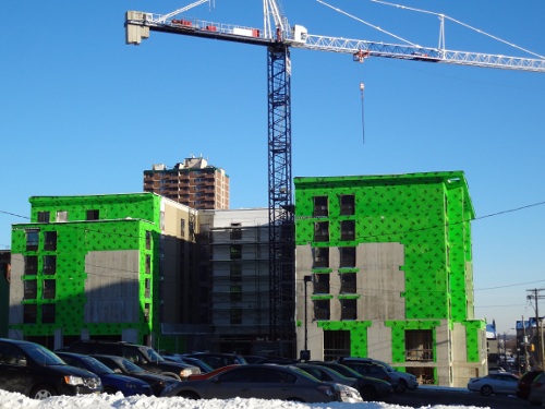 Staybridge hotel under construction at Caroline and George