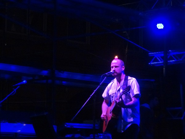 Wax Mannequin, performing with a lit candle on his head