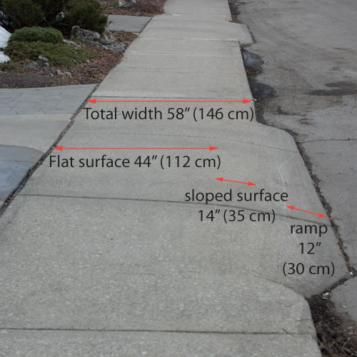 Sidewalk driveway cut, older design