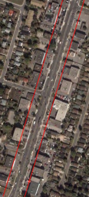 A boulevard on Upper James: the red lines indicate the borders of the boulevard, which would replace parking lots with pedestrian space and stream cars into high-speed through traffic in the centre and low-speed local traffic on the outside. (Image Credit: Google Maps)