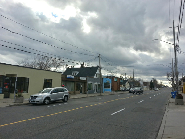 Curbside parking is allowed on the east side off-peak hours